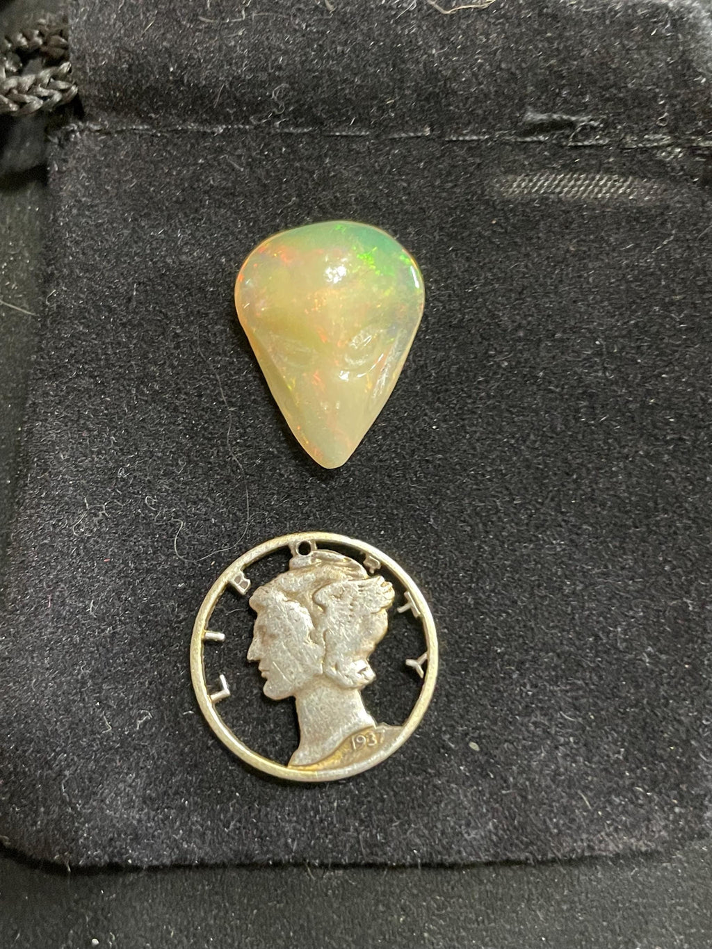 Ethiopian Opal Alien Head Carving