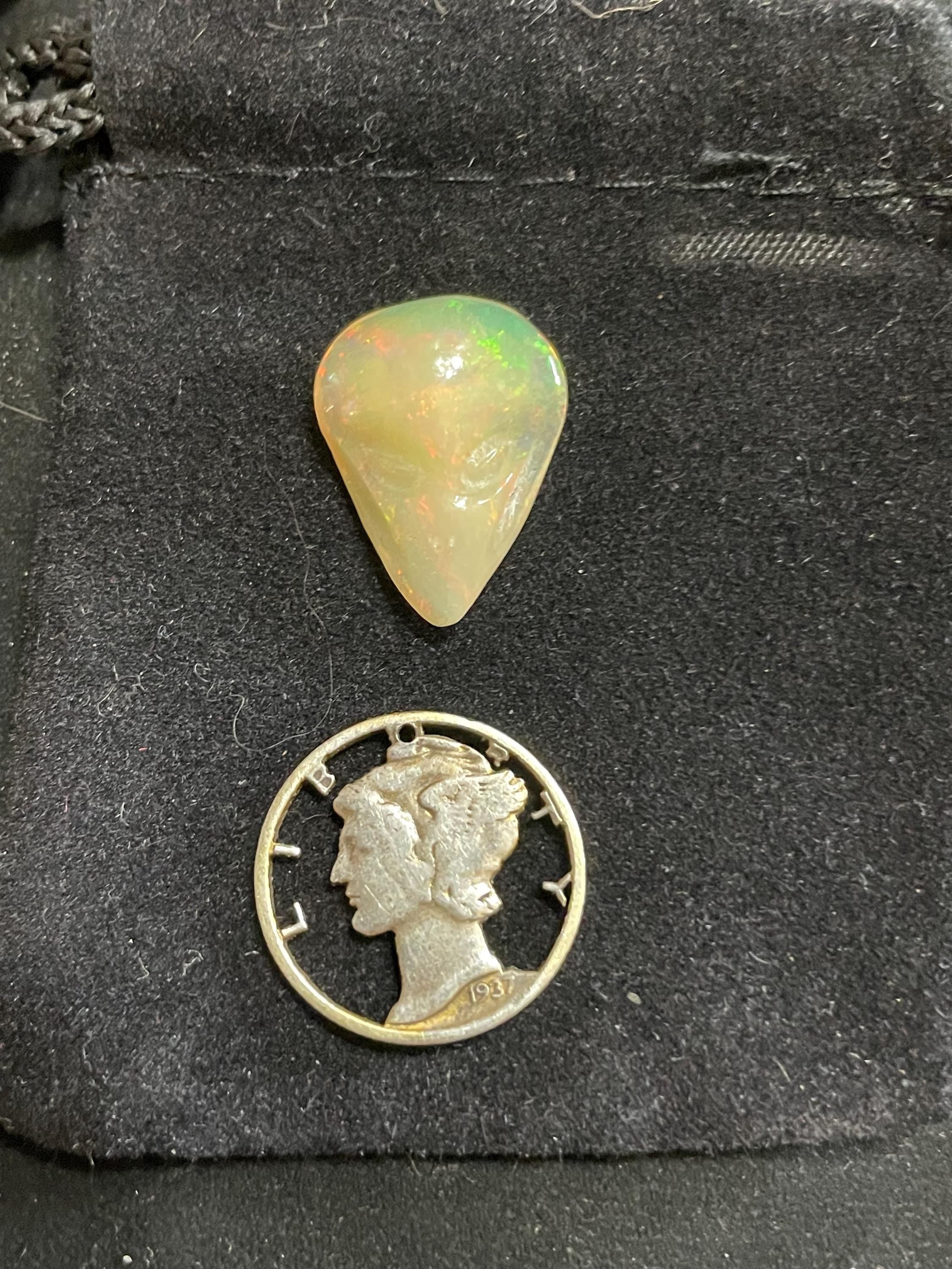 Ethiopian Opal Alien Head Carving