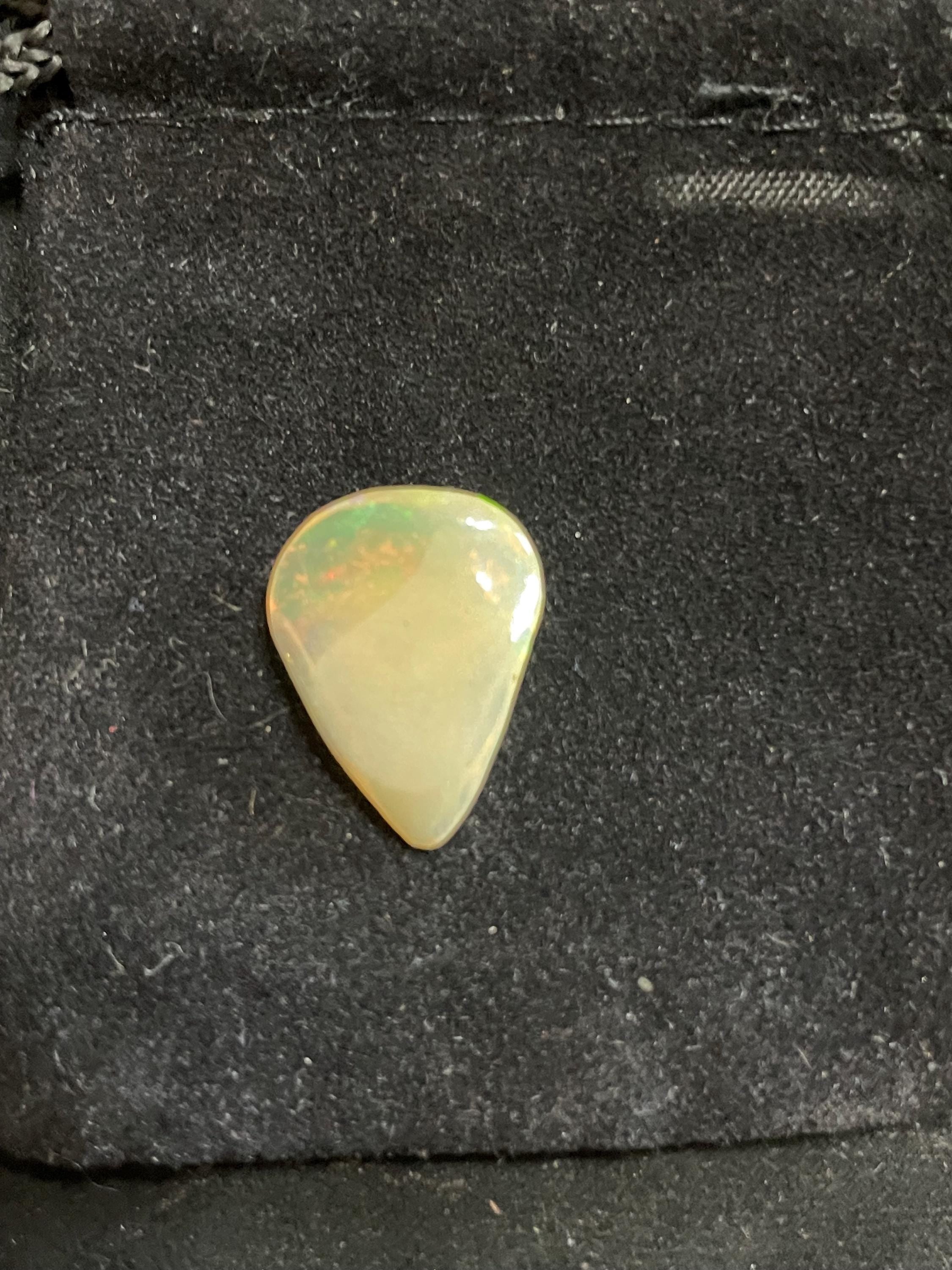 Ethiopian Opal Alien Head Carving